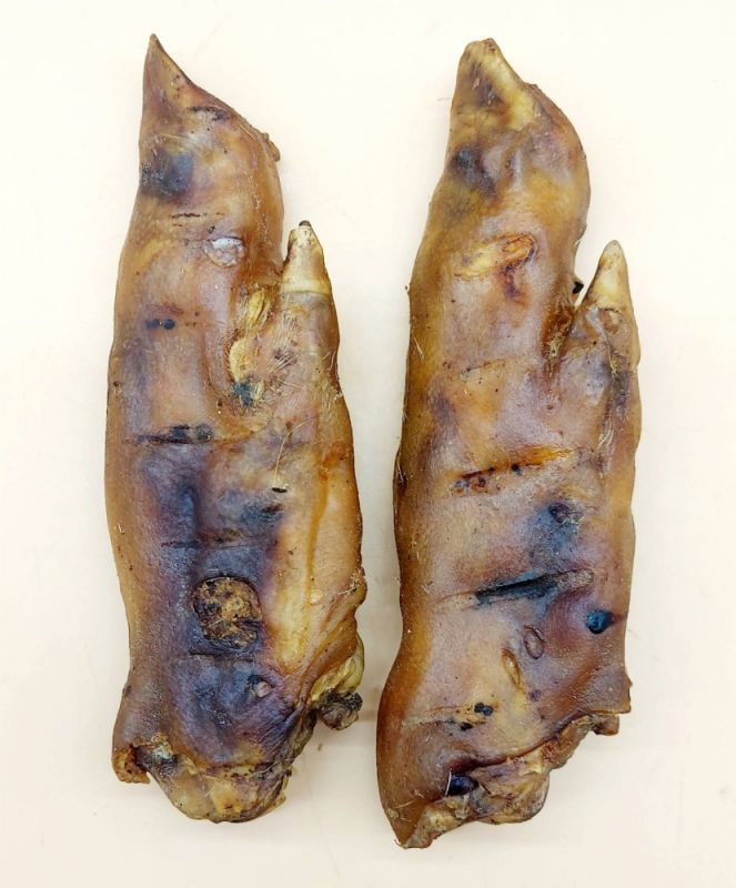 Свинячі ніжки-ласощі для собак 2 шт Ласощі для собак свинячі ніжки